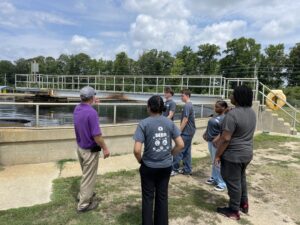 SEED students getting a tour of a water tank