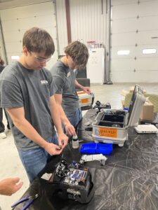 SEED students working with small electric tools