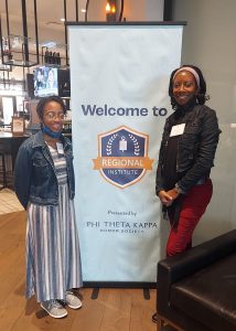 photo of Naomi King & Angela Grantham with PTK pop-up banner